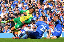 Martin Olsson is brought down by a combination of John Terry and Ashley Cole