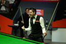 Mark Selby celebrates potting the final black to win the World Championship