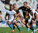 Chiefs' Gareth Anscombe attempts to control the ball against the Cheetahs