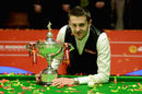 Mark Selby poses with the World Championship trophy