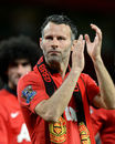 Ryan Giggs applauds the Manchester United fans during the players' lap of honour