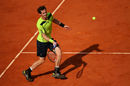 Andy Murray suffered a shock straight-sets defeat to Santiago Giraldo in the third round of the Madrid Open