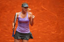 Maria Sharapova is safely through to the last eight in Madrid following victory against Samantha Stosur