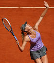 Maria Sharapova came from a set down to book her place in the semi-finals