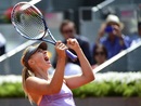 Maria Sharapova celebrates her win after booking a spot in the Madrid Open final