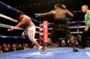 Bermane Stiverne knocks down Chris Arreola for the second time in the sixth round of their WBC Heavyweight Championship match