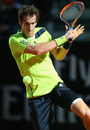 Andy Murray plays a backhand to Rafael Nadal
