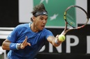 Rafael Nadal plays a forehand return