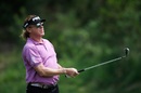 Miguel Angel Jimenez hits his second shot on the first hole
