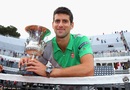 Novak Djokovic poses with the Rome Masters trophy