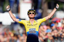 Michael Rogers celebrates as he crosses the line to win stage 11 of the Giro d'Italia