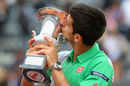 Novak Djokovic kisses the Rome Masters trophy