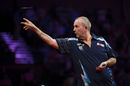 Phil Taylor on his way to victory against Robert Thornton