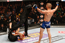 T.J. Dillashaw reacts after knockout out Renan Barao
