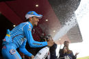Fabio Aru sprays the champagne after winning stage 15