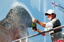 Rory McIlroy celebrates winning the BMW PGA Championship