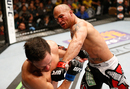 Robbie Lawler punches Jake Ellenberger in their welterweight bout