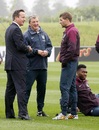 Prime Minister David Cameron speaks with Roy Hodgson and Steven Gerrard during England training