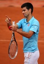 Novak Djokovic joined Roger Federer in the last 16 of the French Open after beating Marin Cilic in four sets