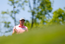 Justin Rose hits his tee shot on the third hole during the second round