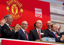Manchester United executives Joel Glazer, Avram Glazer and Ed Woodward prepare to ring the Opening Bell at the New York Stock Exchange
