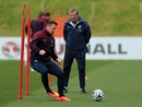 Roy Hodgson casts a watchful eye over Wayne Rooney during training