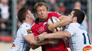 Jonny Wilkinson is sandwiched by Castres tacklers