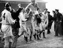 England's Eric Evans is carried off the field