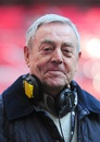Former Liverpool striker Ian St John in his role as a commentator
