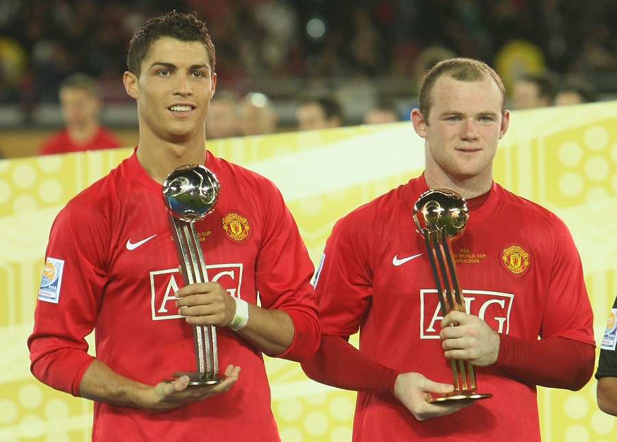 Cristiano Ronaldo and Wayne Rooney pose with their Man of the Match awards