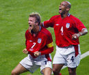 David Beckham celebrates scoring his penalty as England beat Argentina