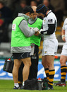 Danny Cipriani receives treatment for a hand injury
