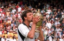 Goran Ivanisevic kisses the Wimbledon trophy