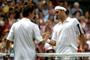 Alex Bogdanovic and Roger Federer shake hands