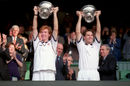 Mark Woodforde (l) and Todd Woodbridge (r) celebrate winning the men's doubles at Wimbledon