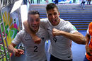 Mathieu Debuchy and Olivier Giroud celebrate after full-time