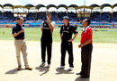 Paul Collingwood looks on as Daniel Vettori of New Zealand tosses the coin 
