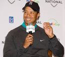 Tiger Woods smiles at his press conference