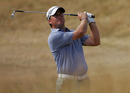 Graeme McDowell hits his approach shot on the 11th hole during the second round of the Open Championship
