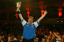 Colin Lloyd celebrates after winning the PDC World Matchplay