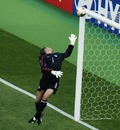 David Seaman stretches to no avail as Ronaldinho's famous lob leaves him with egg on his fence