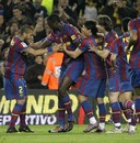 Yaya Toure is congratulated by his teammates