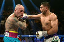 Amir Khan hits Luiz Collazo with a right hook
