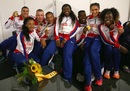 Great Britain's athletes pose with their medals