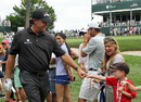 Phil Mickelson greets a young fan at The Barclays