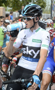 Chris Froome takes a drink as he waits for the start of the seventh stage of the Tour of Spain