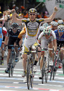 Australia's Matthew Goss celebrates winning the ninth stage