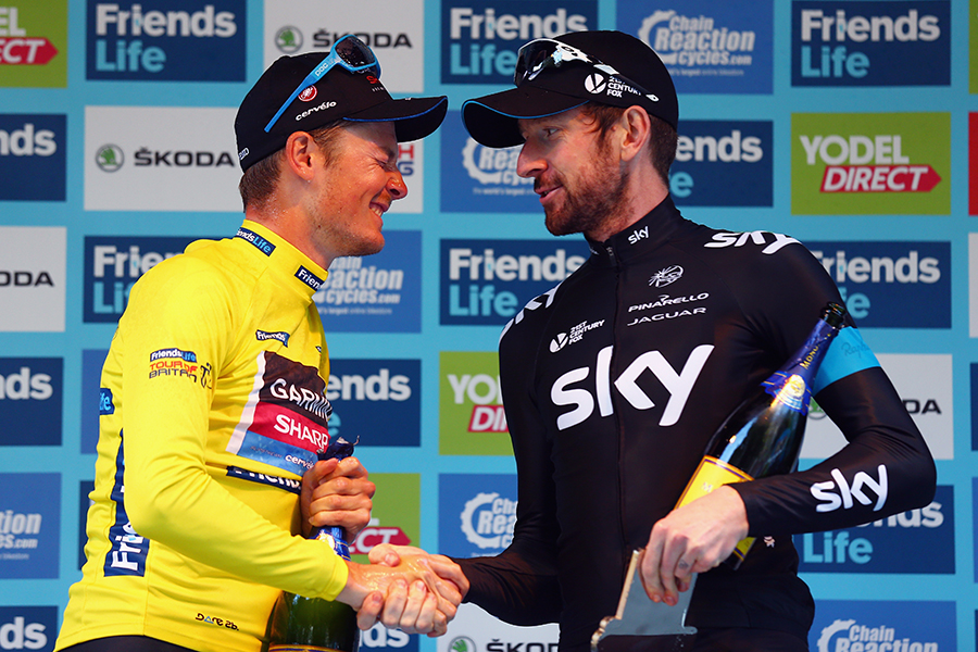 Sir Bradley Wiggins congratulates Tour of Britain winner Dylan van Baarle on the podium after the final stage