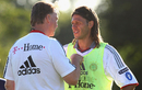 Louis van Gaal talks to Martin Demichelis during a Bayern Munich training session