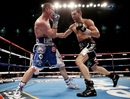 Carl Froch lands a punch on George Groves